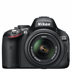 Nikon D5100 con lente